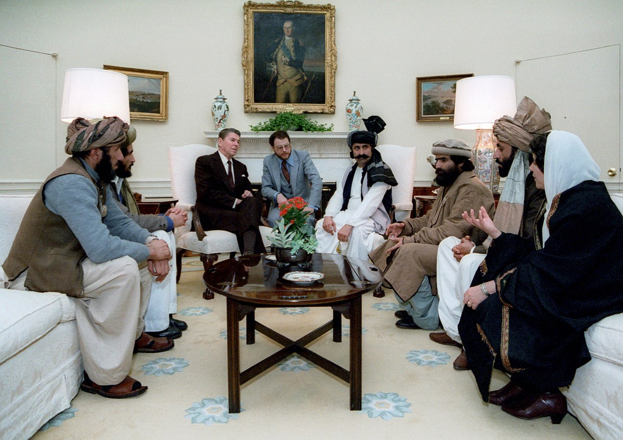 Reagan_sitting_with_people_from_the_Afghanistan_February_1983.jpg